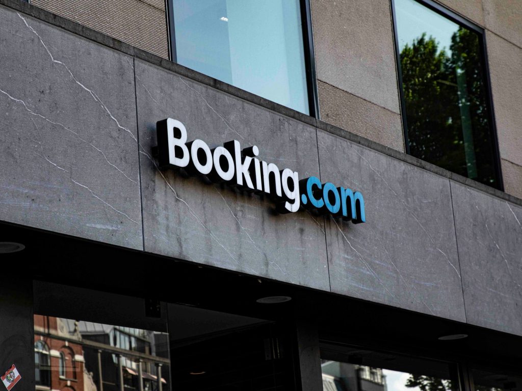 Logo on side of a hotel as Siddhartha Choudhury from Booking.com explains how AI is keeping your bookings – and data – safe from security threats like online fraud.
