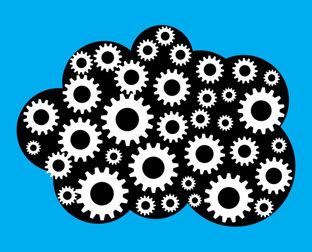 Cloud illustration with cogs as Greg Holmes, Field CTO for EMEA at Apptio, an IBM company, argues that successfully scaling intelligent automation requires financial rigour.