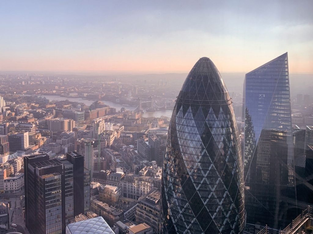 London city skyline as UK authorities believe improving efficiency across national finance operations requires applying AI platforms from vendors like Palantir.