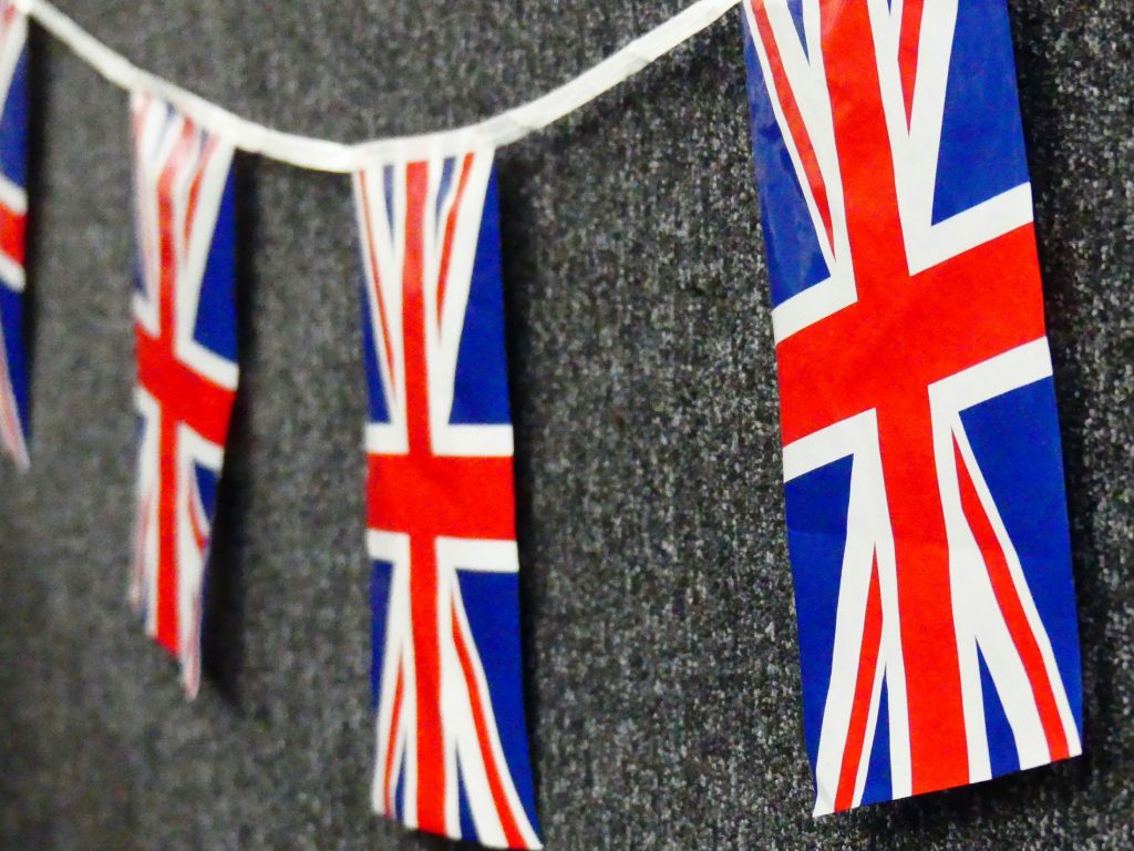Union Jack flags on bunting as a government report has found that surging investment has driven UK AI sector growth to outpace the wider economy by 150 times since 2022.